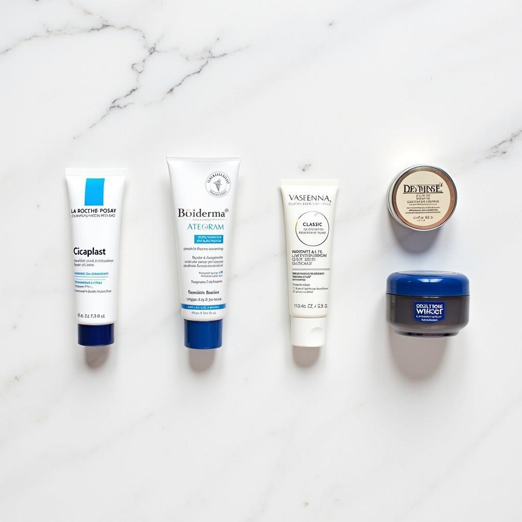 Ảnh chụp flatlay các sản phẩm son dưỡng kích màu môi sau phun xăm uy tín như La Roche-Posay, Bioderma, Vaseline, Nuxe trên nền trắng tinh tế.
